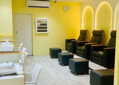 Relaxing interior of Pomegranate in Cape Town, Western Cape, ZA with comfortable seating and modern decor.