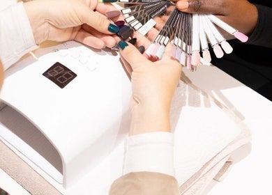 Diverse nail polish selection at Pomegranate, Cape Town, Western Cape, ZA offering vibrant and stylish choices.