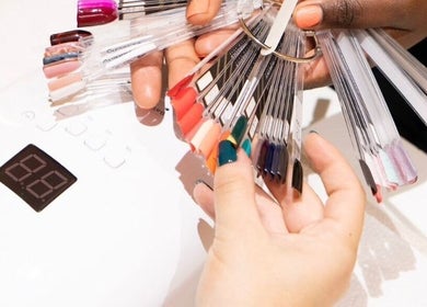Nail polish palette selection at Pomegranate, Cape Town, Western Cape, ZA, showcasing a vibrant color range.