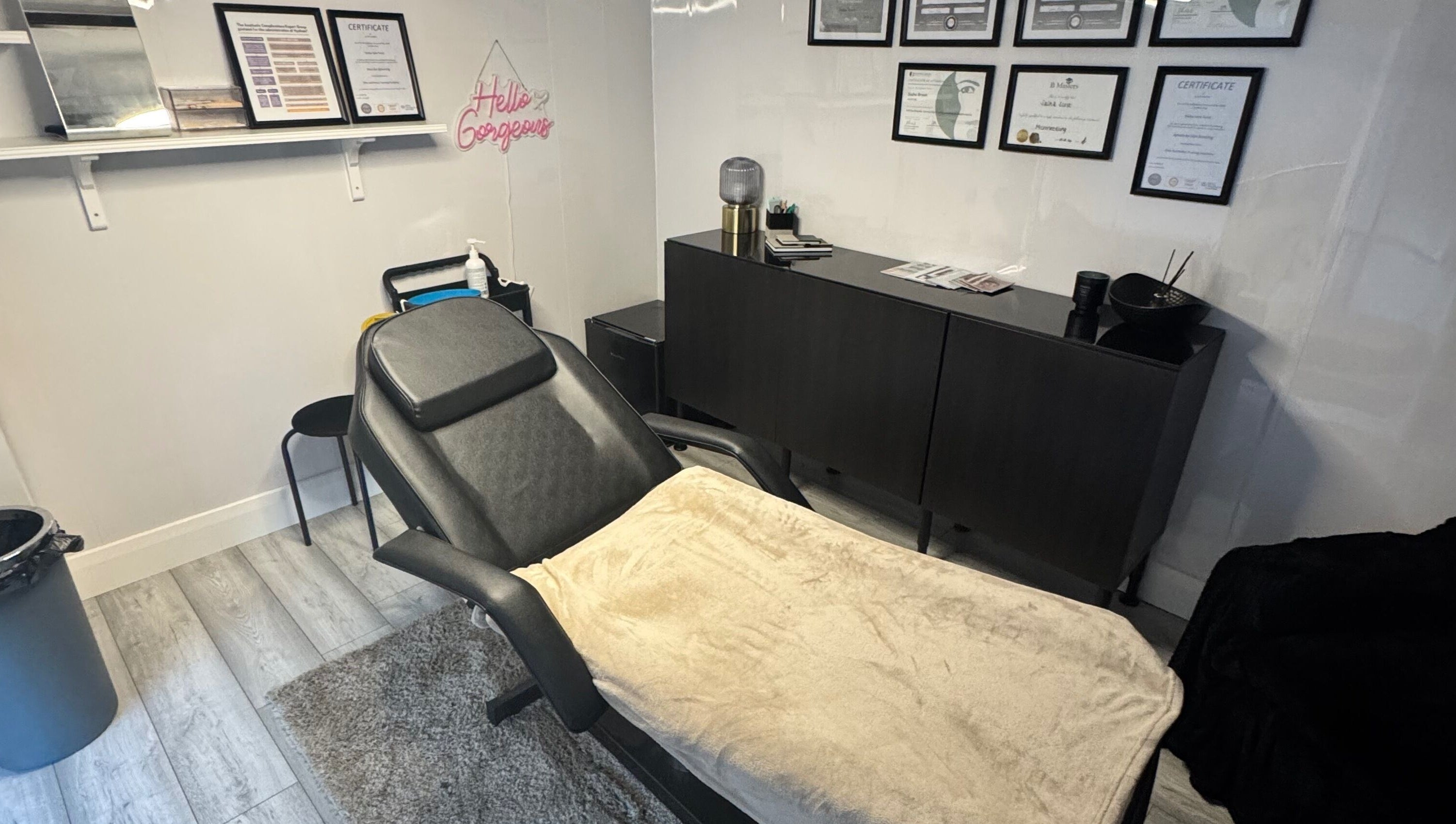 Elegant treatment room at Diamond Aesthetics in Reading, England, GB featuring modern decor and a plush bed.