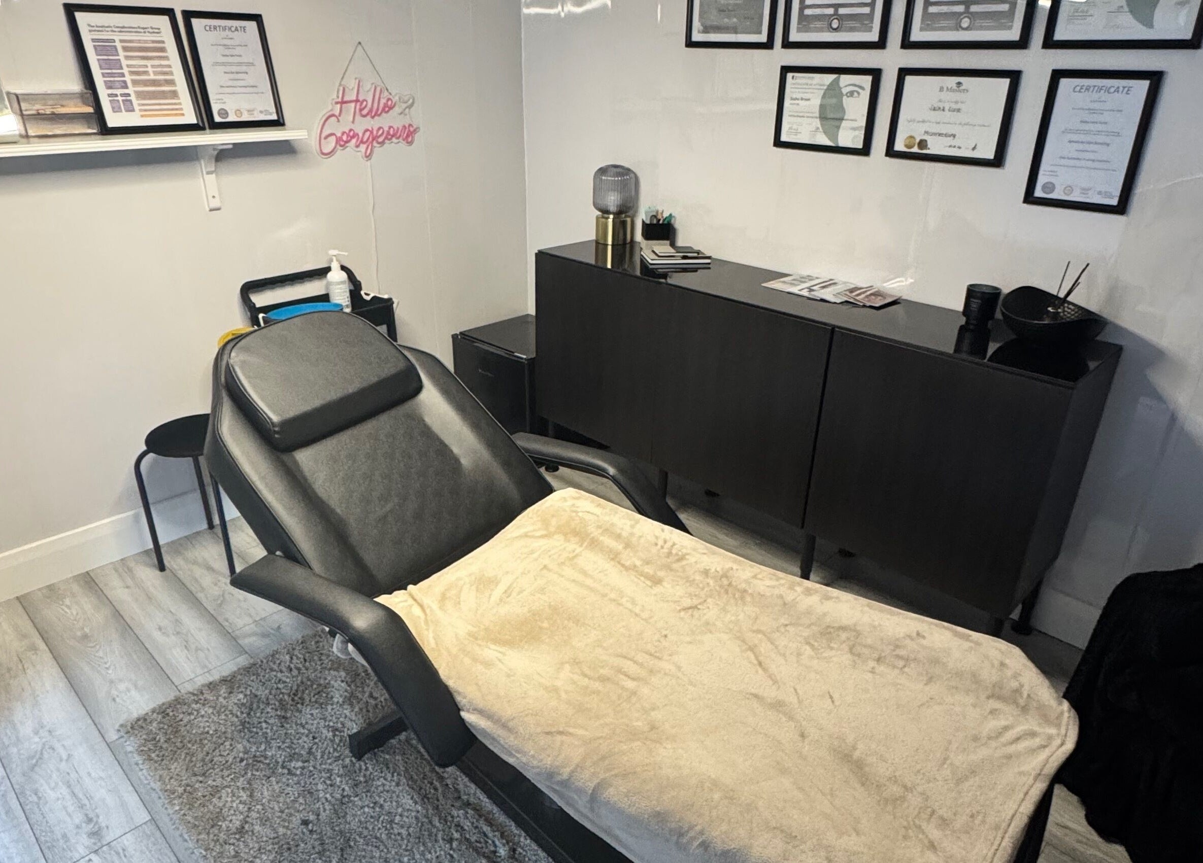 Elegant treatment room at Diamond Aesthetics in Reading, England, GB featuring modern decor and a plush bed.