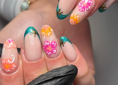 Vibrant floral nail art design at Juicy Gels in Halifax, England, GB, showcasing exquisite craftsmanship.