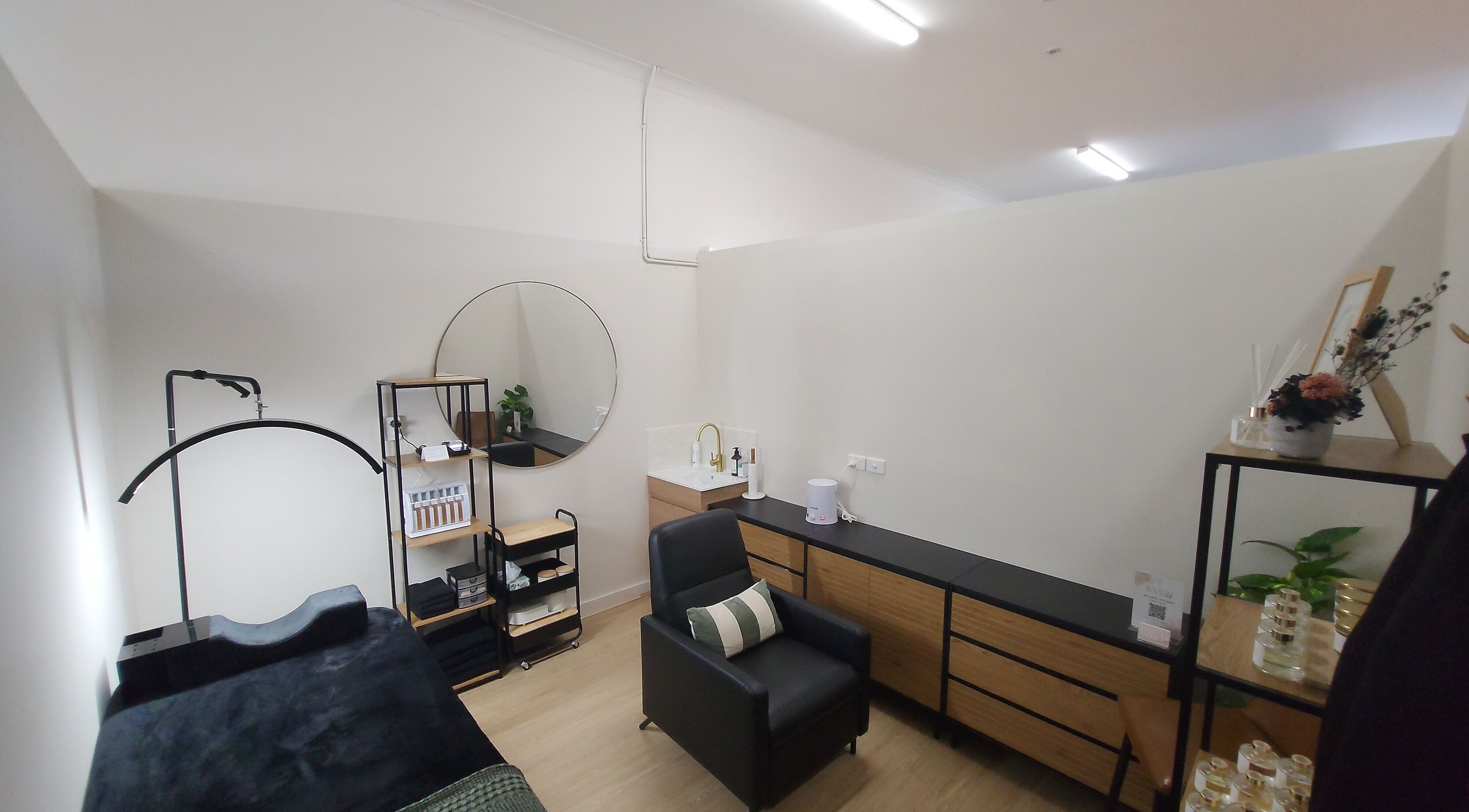 Modern beauty treatment room at BNVD Beauty, Melbourne, Victoria, AU featuring sleek design and cozy atmosphere.