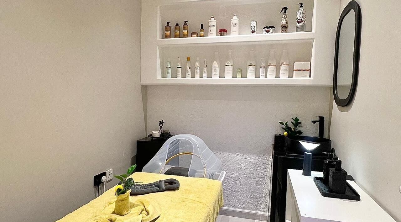 Cozy spa room at Capri Beauty Center, Sharjah, Sharjah, AE, with a treatment bed and soothing decor.