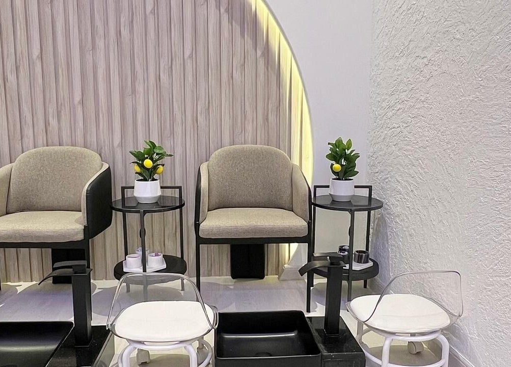 Luxurious pedicure chairs at Capri Beauty Center, Sharjah, Sharjah, AE, showcasing stylish and comfortable setup.
