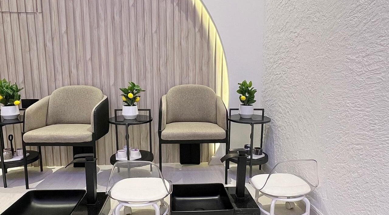 Luxurious pedicure chairs at Capri Beauty Center, Sharjah, Sharjah, AE, showcasing stylish and comfortable setup.