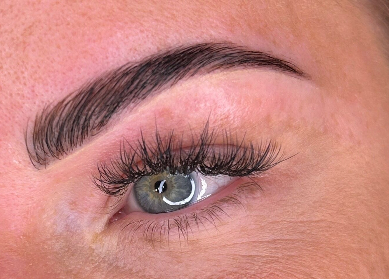 Close-up of expertly shaped eyebrow and lashes at Tru.Beautea, Barton Seagrave, England, GB.