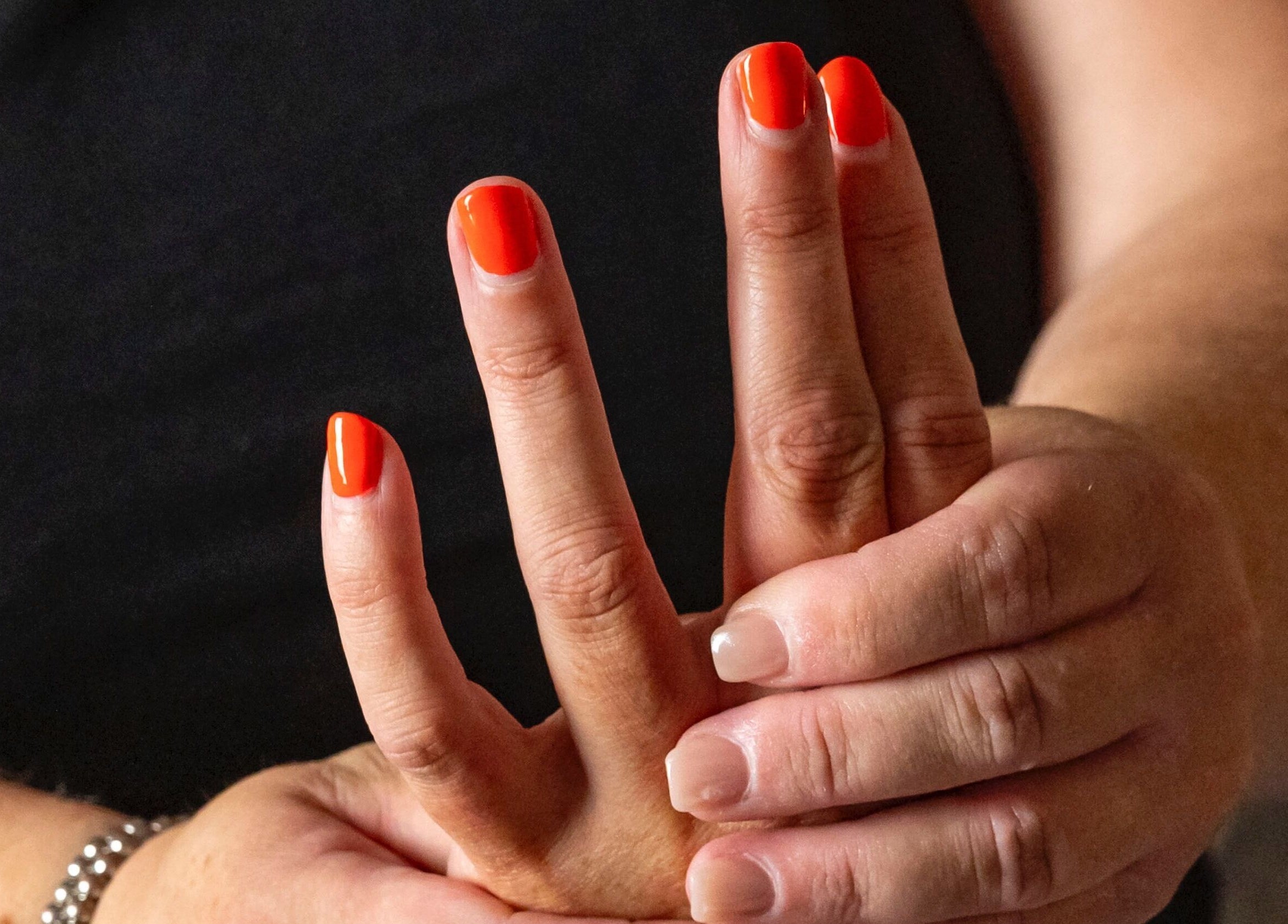Bold red manicure at Blossoms Japanese Head Spa, Handforth, England, GB.