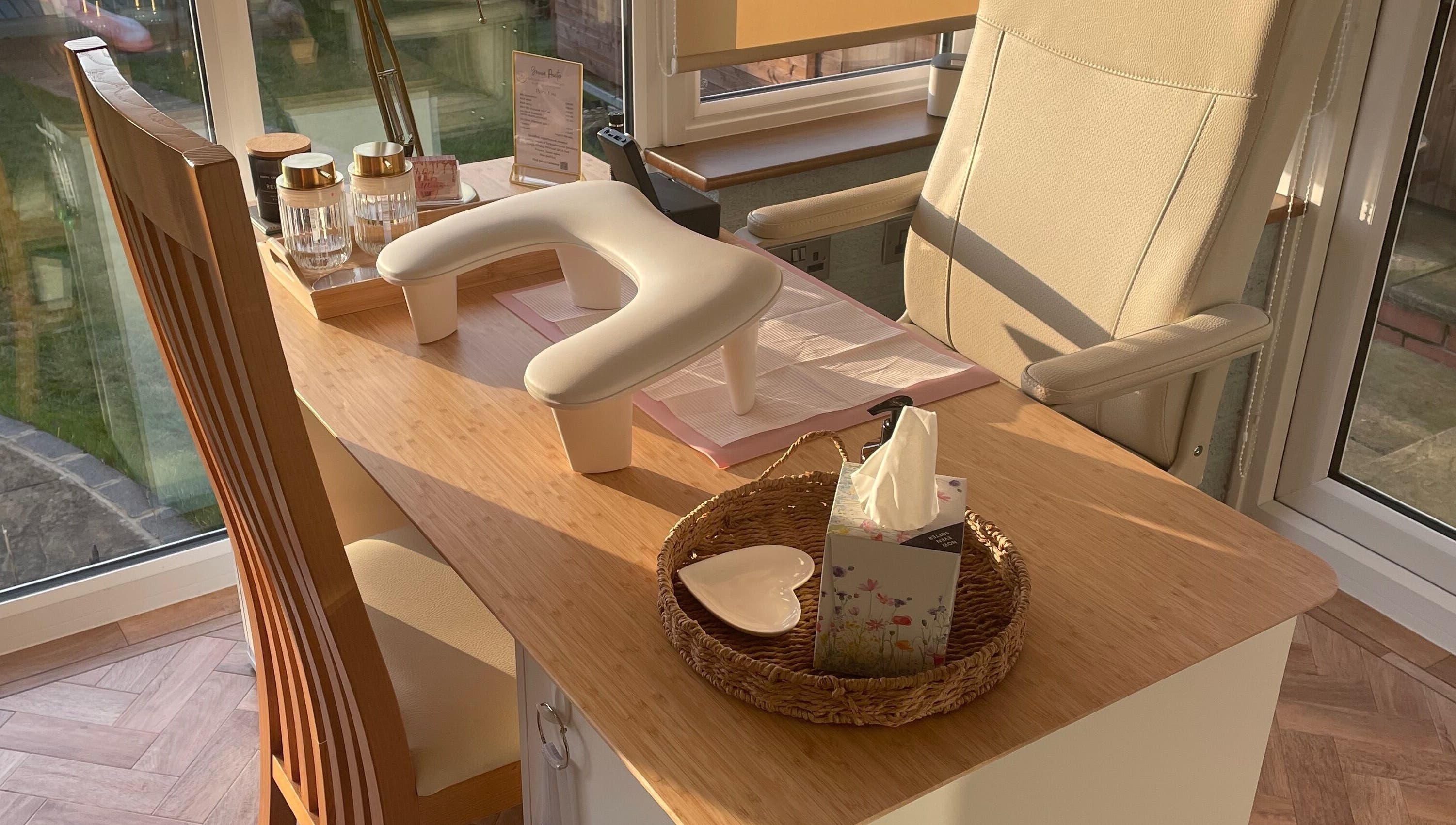 Bright nail station at Nails @ no.7, Bromsgrove, England, GB with chic decor and comfy seating.