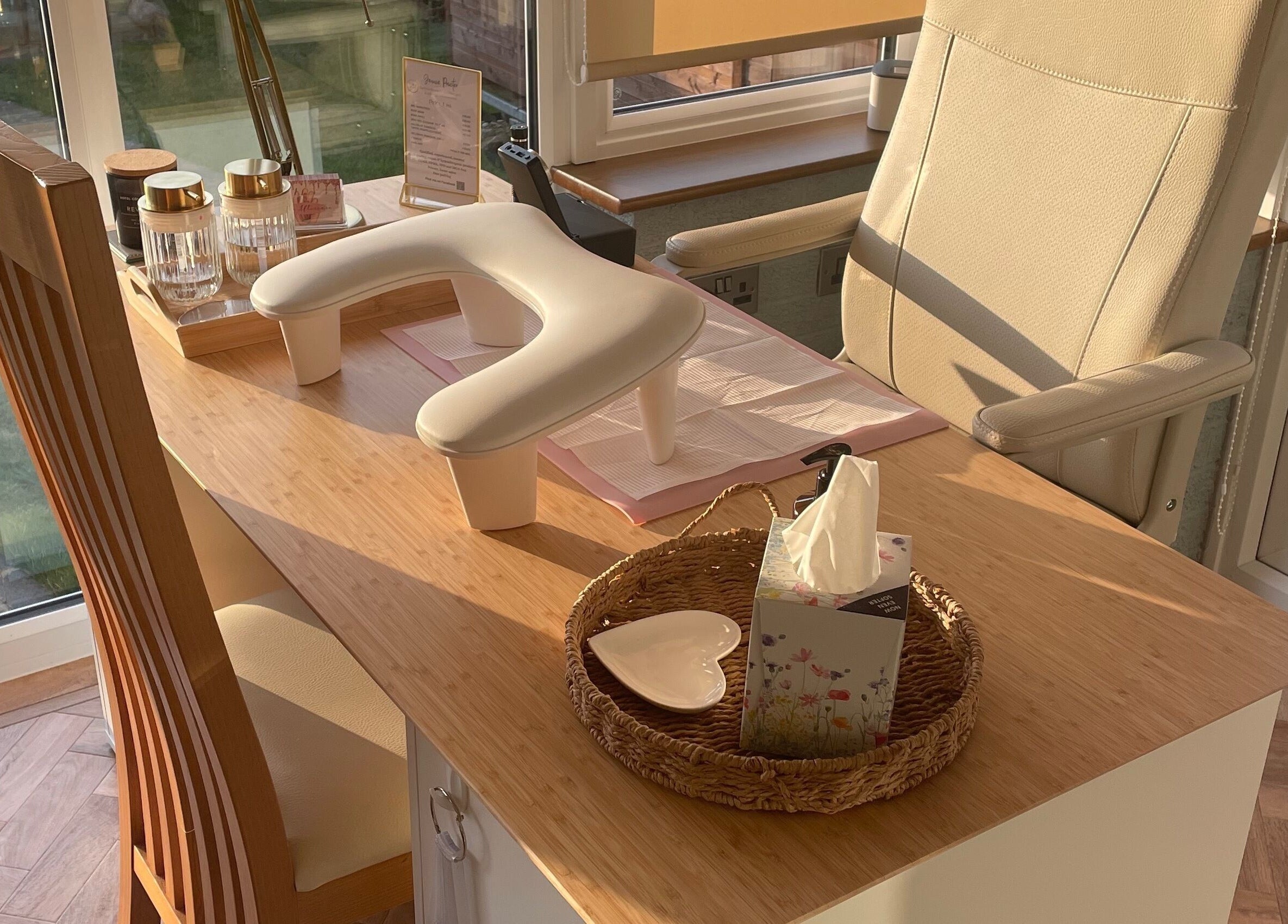 Bright nail station at Nails @ no.7, Bromsgrove, England, GB with chic decor and comfy seating.