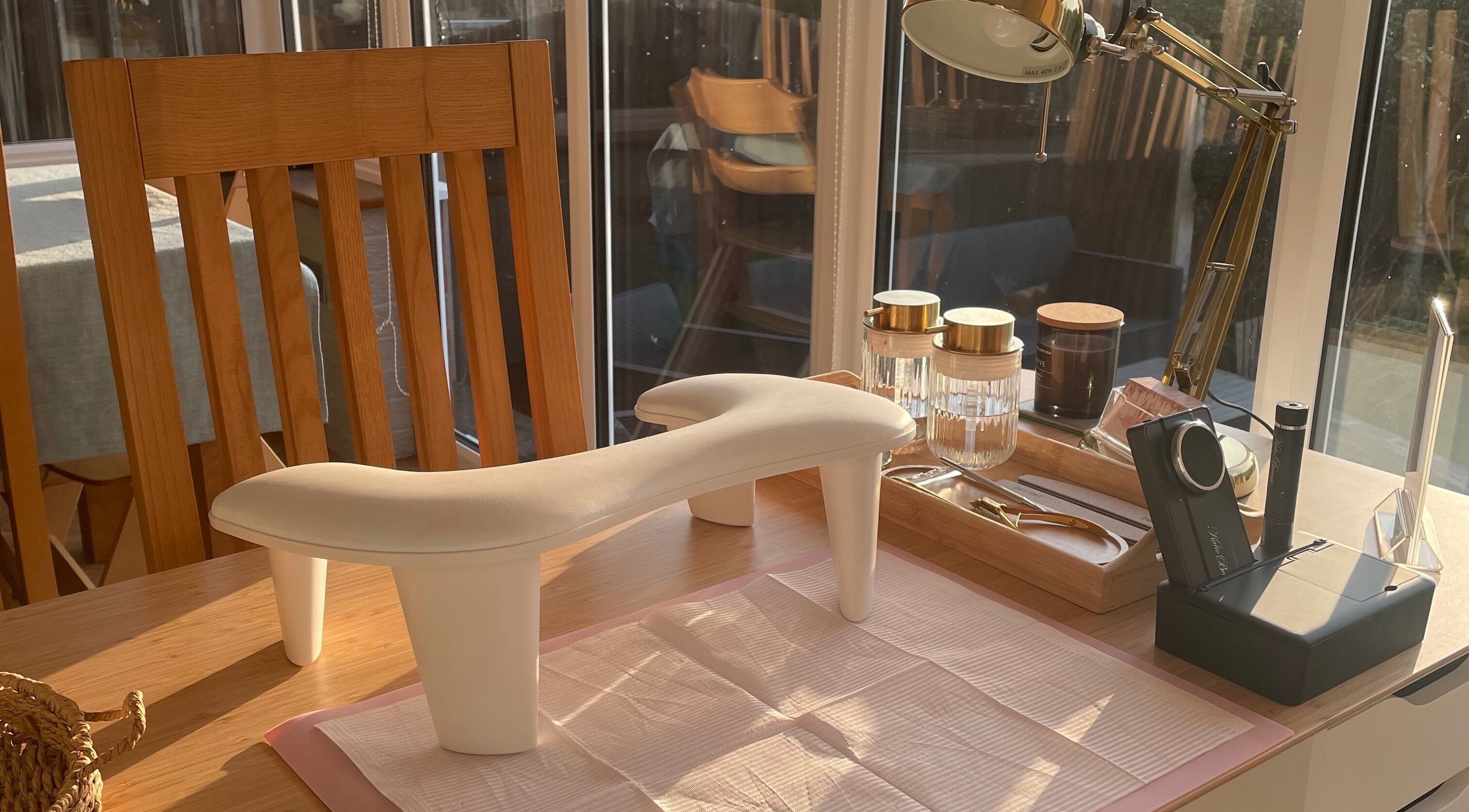 Nail care setup at Nails @ no.7, Bromsgrove, England, GB. Sunlit table with tools and decor.
