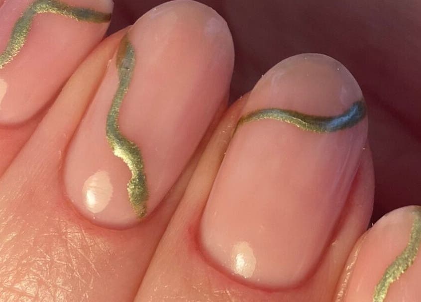 Elegant gold and green nail art at Nails @ no.7, Bromsgrove, England, GB.