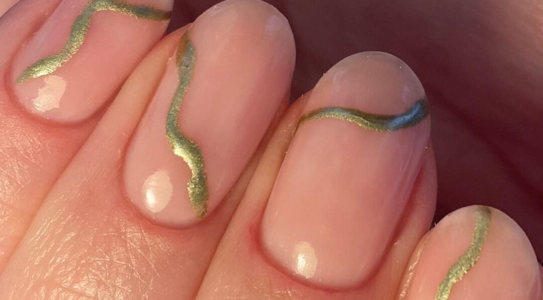 Elegant gold and green nail art at Nails @ no.7, Bromsgrove, England, GB.