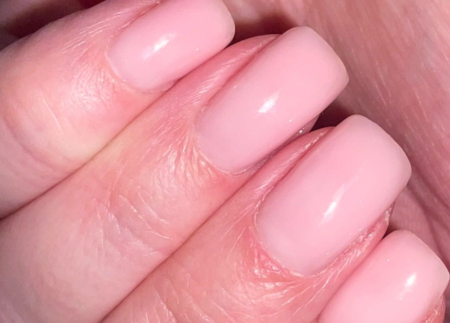 Close-up of pink manicured nails at Nails @ no.7, Bromsgrove, England, GB.