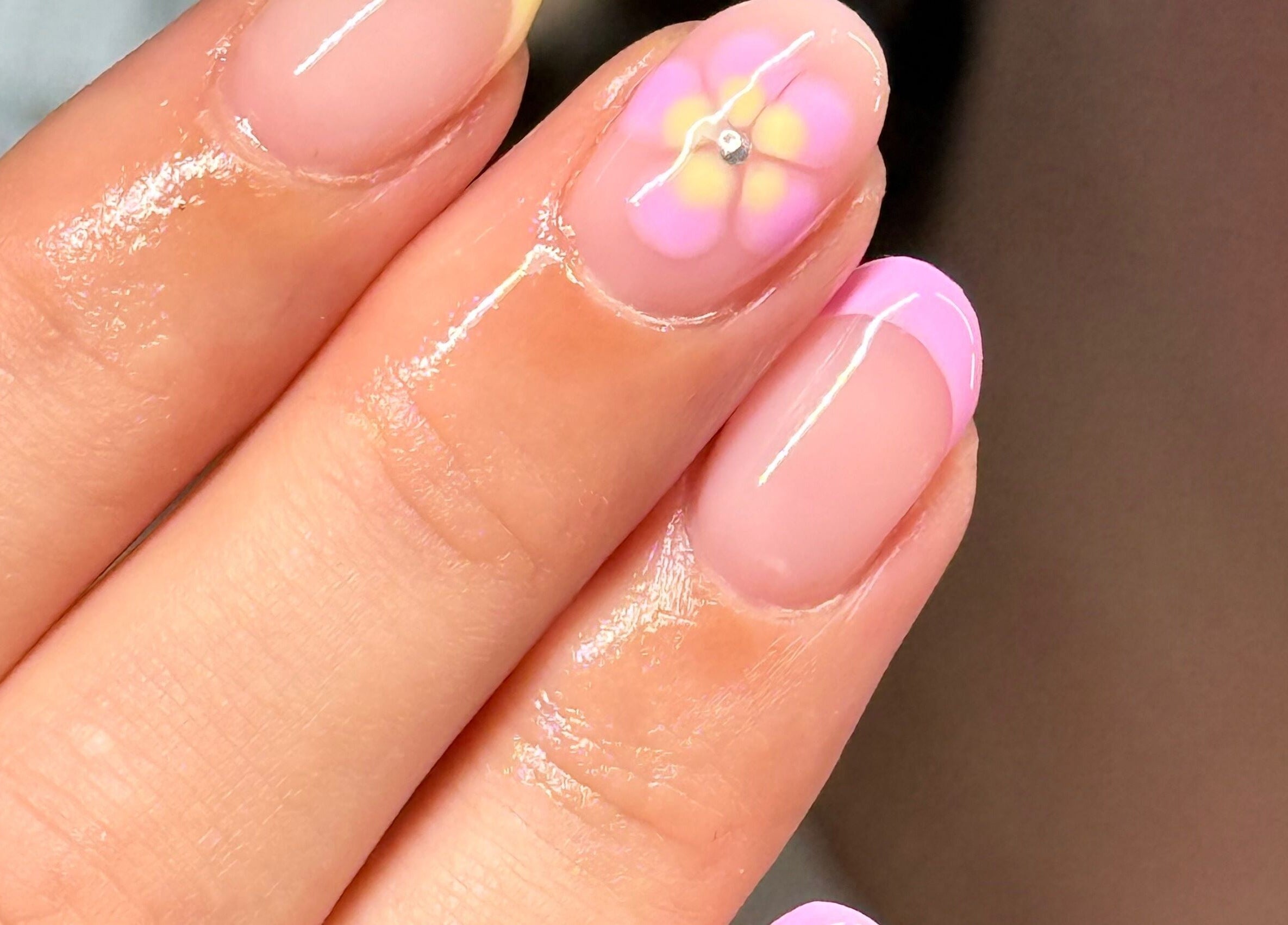 Beautiful flower nail art at HJMNails in Haywards Heath, England, GB showcasing delicate pink designs.