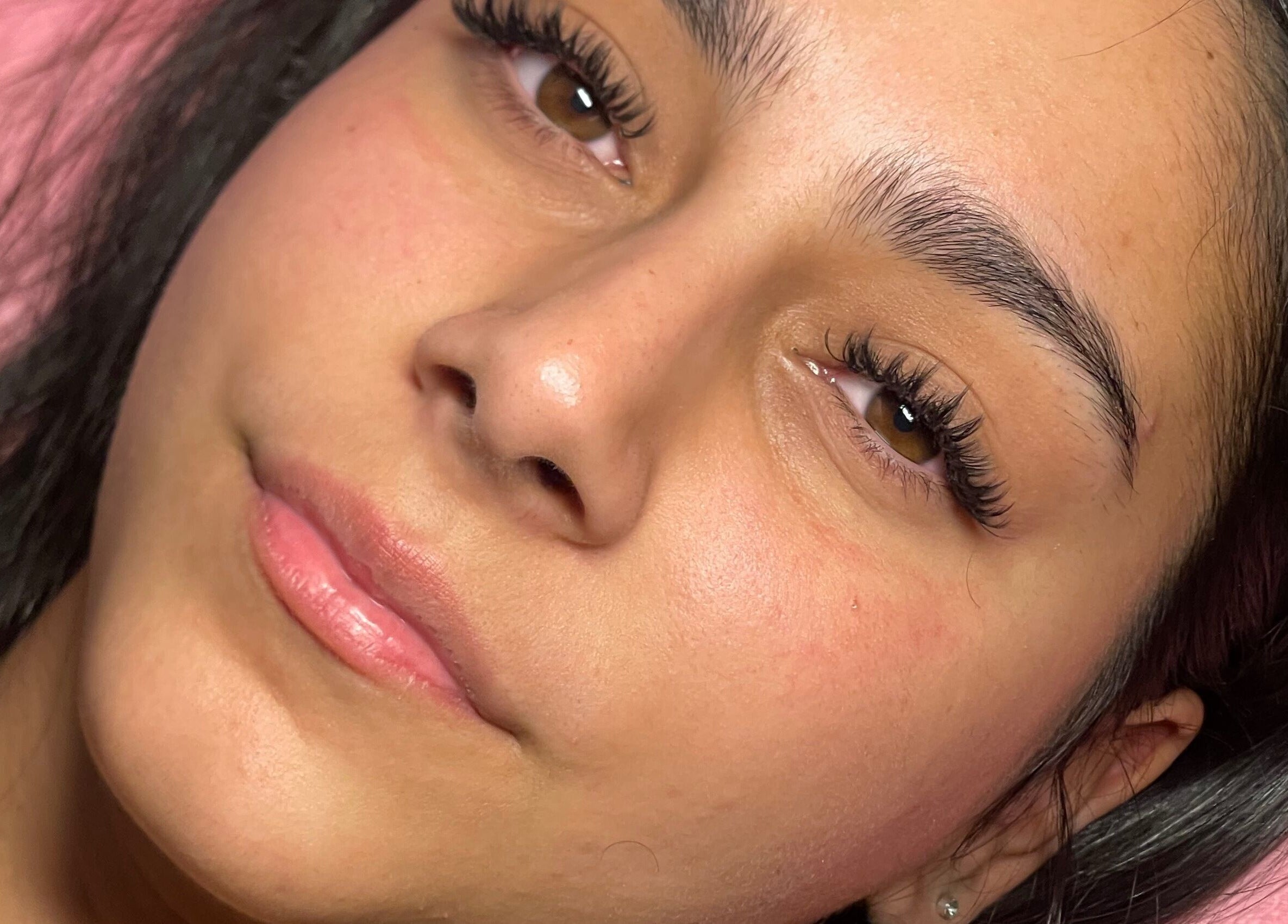 Close-up of a client's enhanced lashes at Teeluxe Beauty in Potters Bar, England, GB.