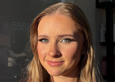 Woman with makeup at Lucy Cahill Make Up in Warrnambool, Victoria, AU, showcasing flawless, radiant skin.