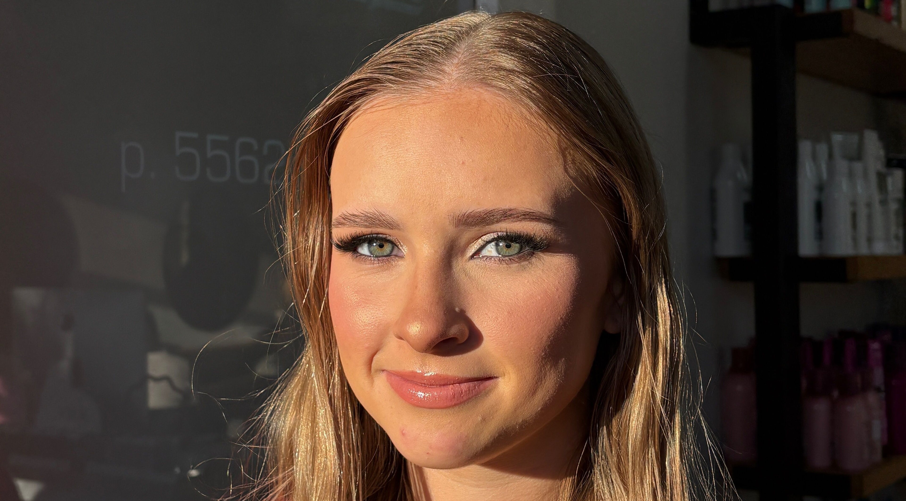 Woman with makeup at Lucy Cahill Make Up in Warrnambool, Victoria, AU, showcasing flawless, radiant skin.