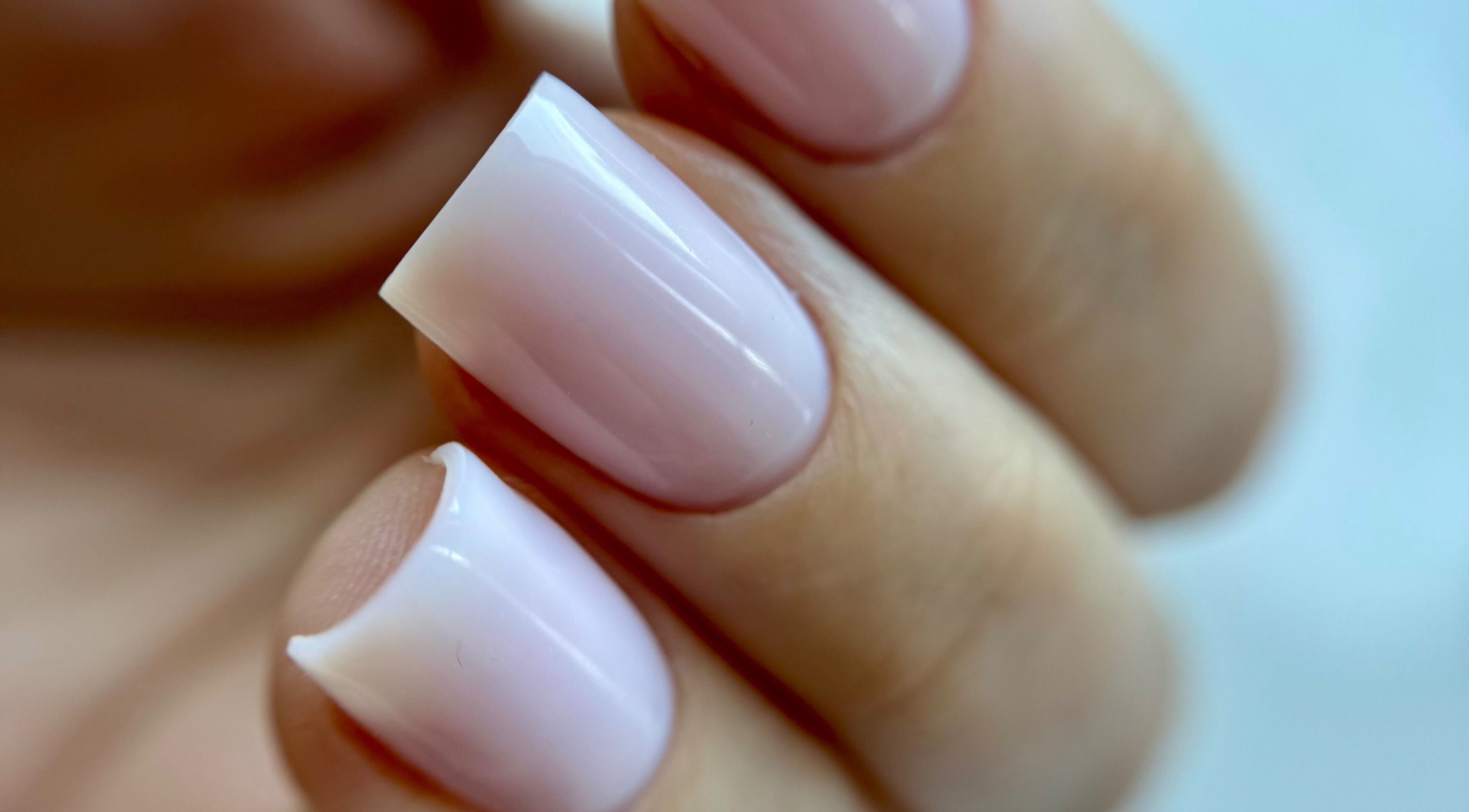Close-up of manicured nails at Nail_House_by_Ilze in Rīga, LV, showcasing sophisticated nail artistry.