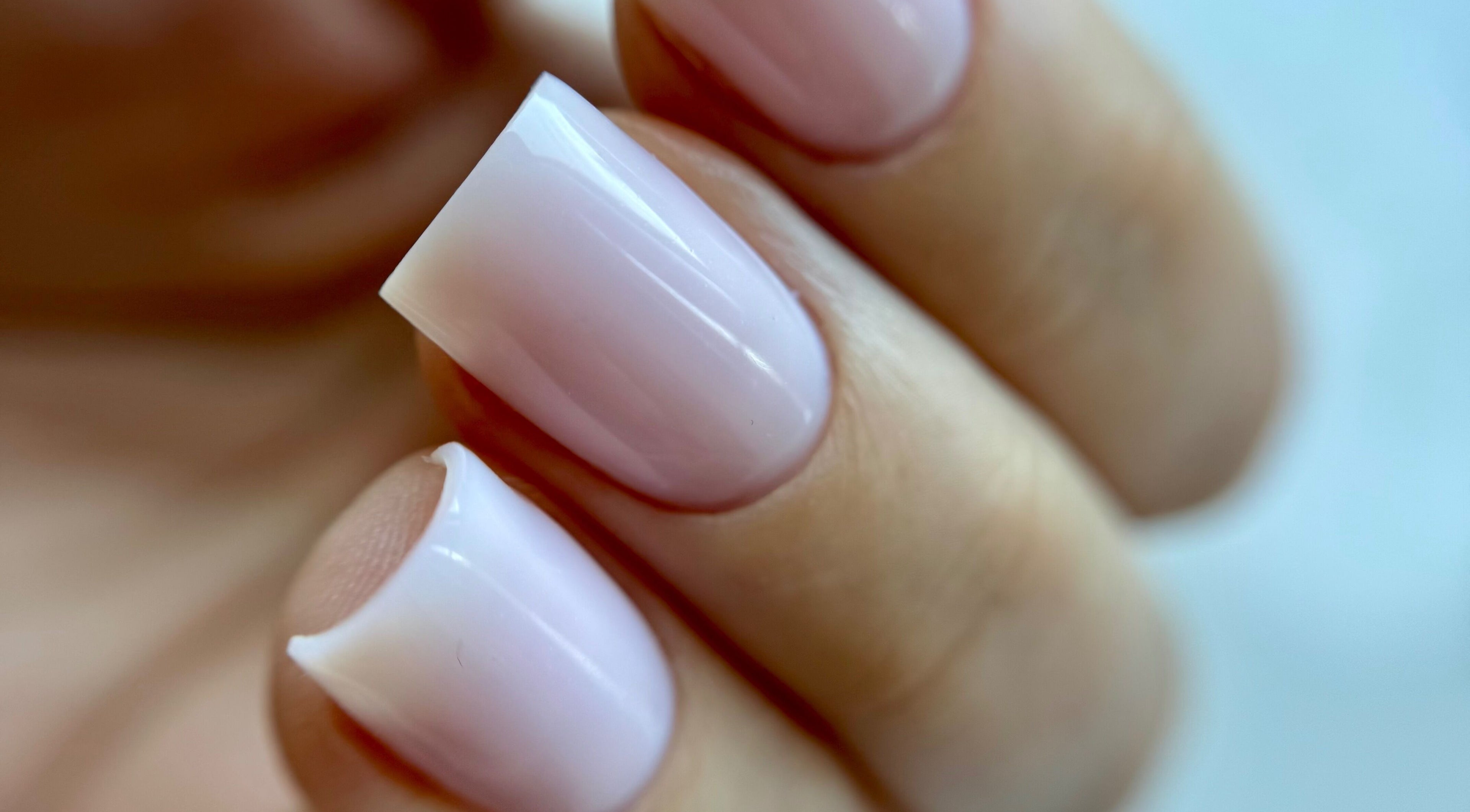 Close-up of manicured nails at Nail_House_by_Ilze in Rīga, LV, showcasing sophisticated nail artistry.