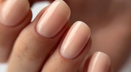 Close-up of well-groomed nails at Nail_House_by_Ilze in Rīga, LV, showcasing nude polish.