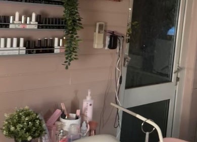 The Glow Room in York, England, GB offers a cozy, well-organized beauty nook with products and plants.