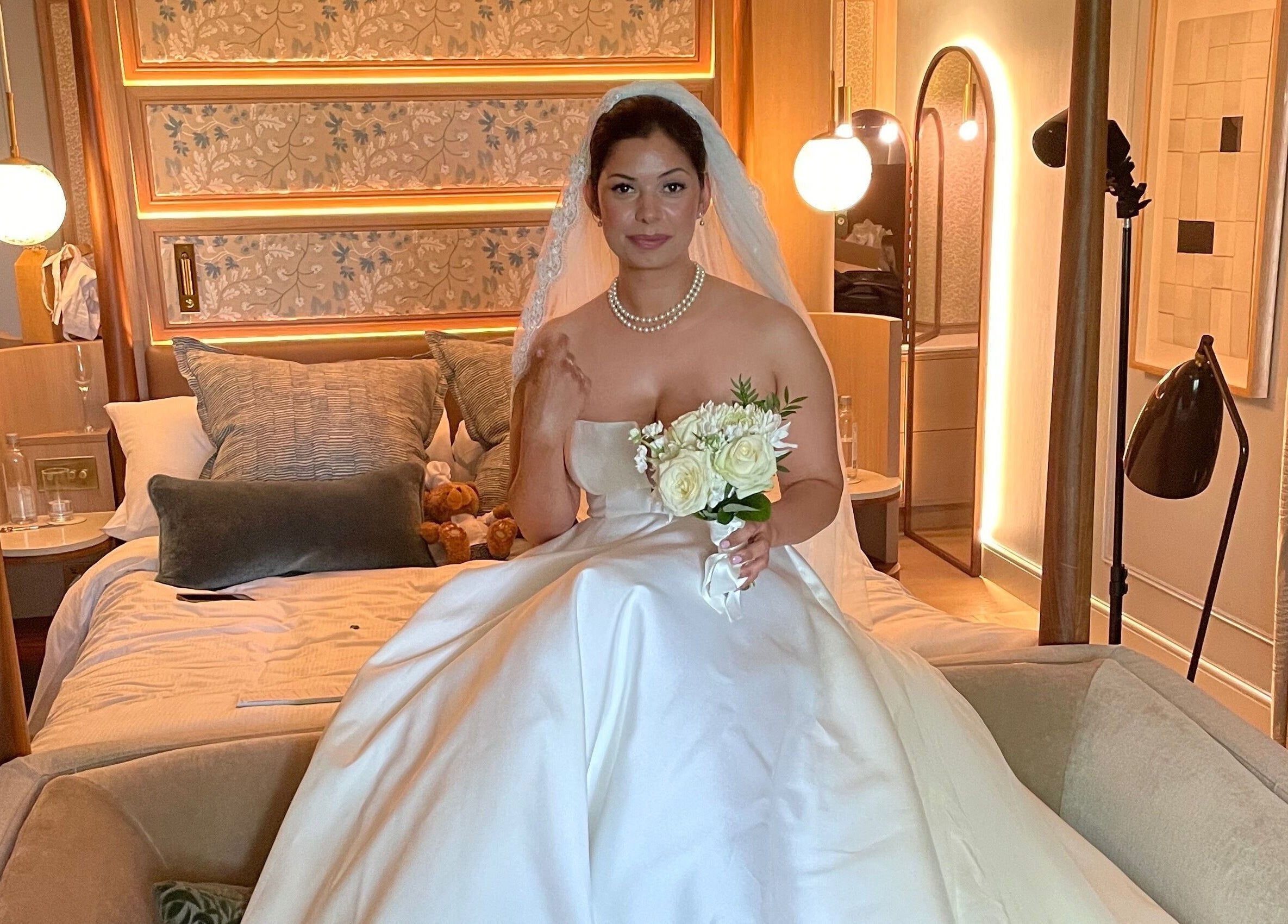 Bride in gown at Lisa Critchley Makeup Artist studio, Abbots Langley, England, GB.