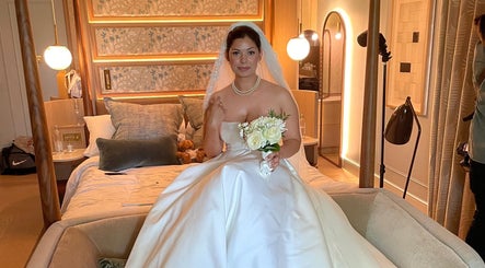Bride in gown at Lisa Critchley Makeup Artist studio, Abbots Langley, England, GB.