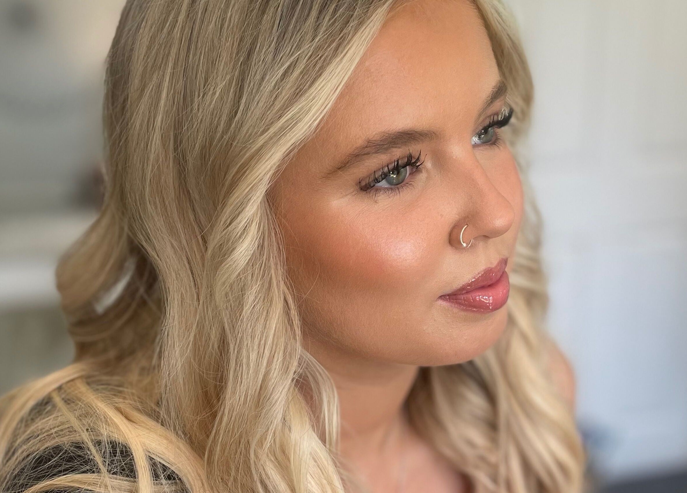 Elegant makeup and blonde hair styling by Lisa Critchley Makeup Artist in Abbots Langley, England, GB.