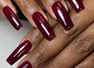 Elegant burgundy manicure at Biromi Nails & Beauty, Boksburg, Gauteng, ZA. Perfectly polished nails.