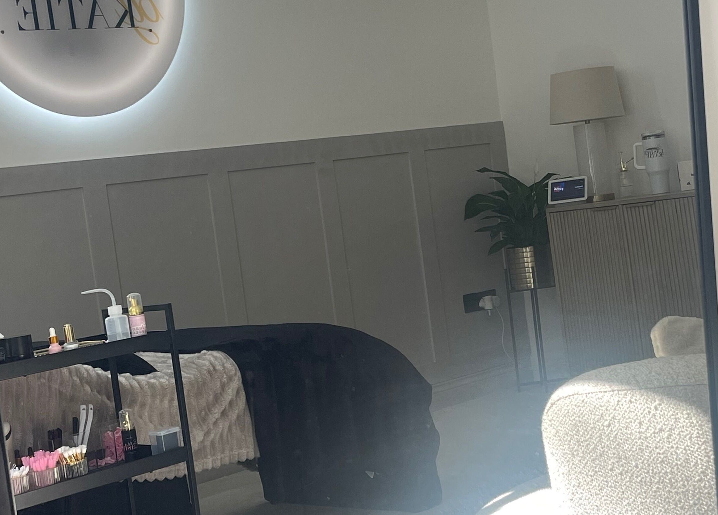 Elegant beauty treatment room at Xlashedbykatiex, Ponteland, England, GB with comfortable setup.