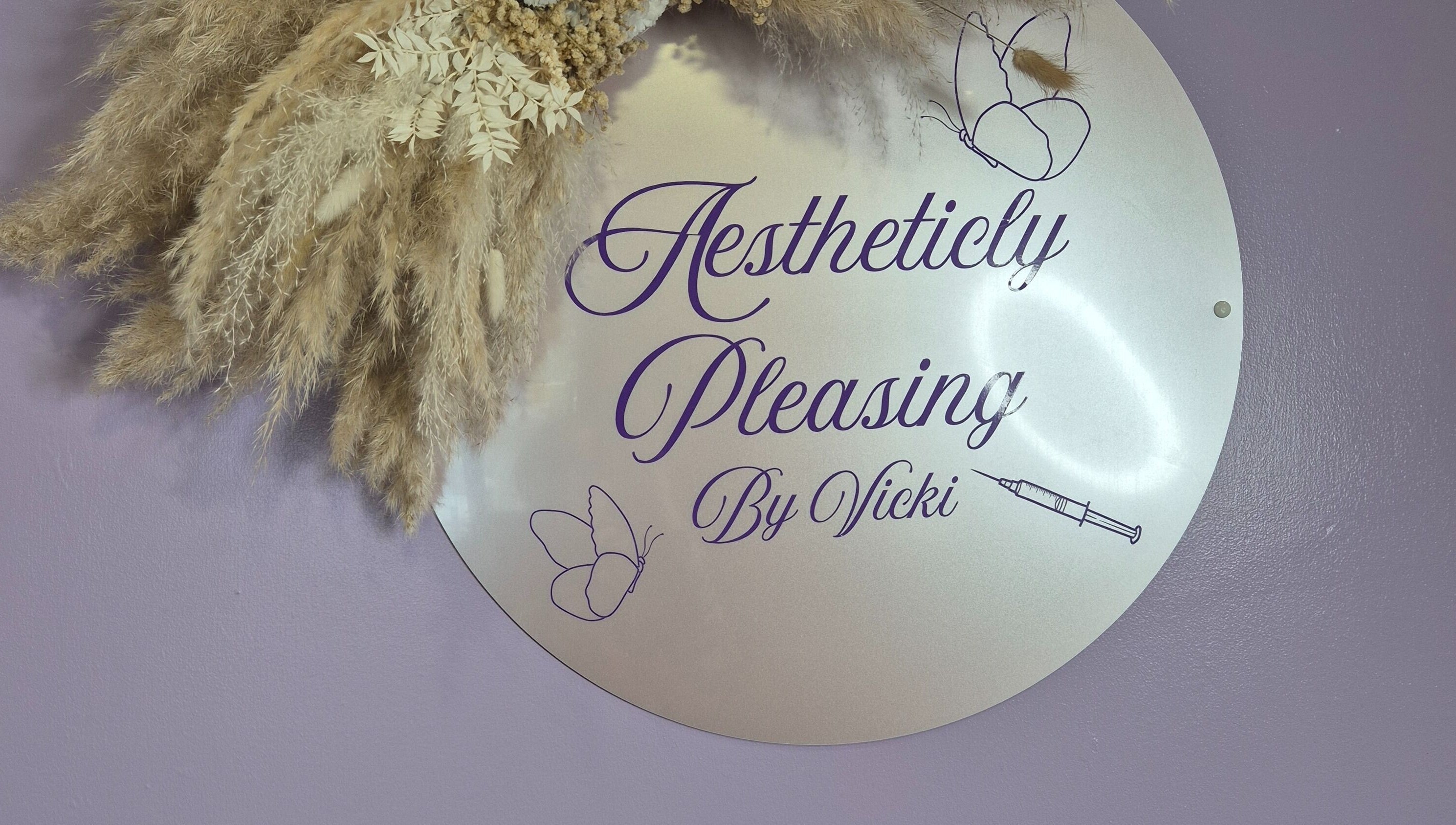 Sign with pampas grass at Aestheticly Pleasing By Vicki, Rutherglen, Scotland, GB.