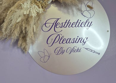 Sign with pampas grass at Aestheticly Pleasing By Vicki, Rutherglen, Scotland, GB.
