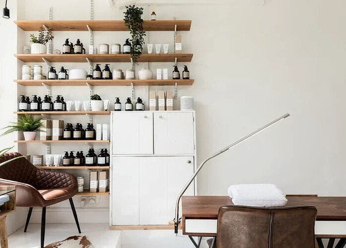 Kabuki Studios elegant interior with shelves of skincare products in Bristol, England, GB.