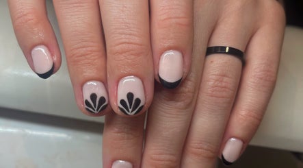 Elegant black and nude manicure at Glam By TAM, Stevenage, England, GB showcasing artful design.