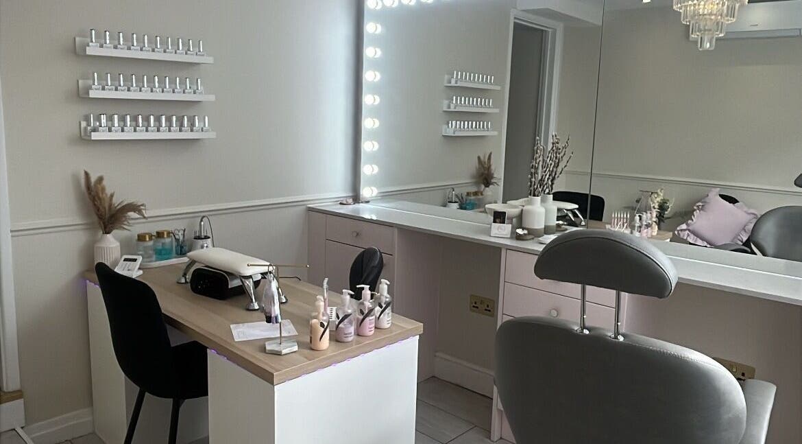 Modern beauty station at Glam By TAM, Stevenage, England, GB with chic decor and illuminated mirror.