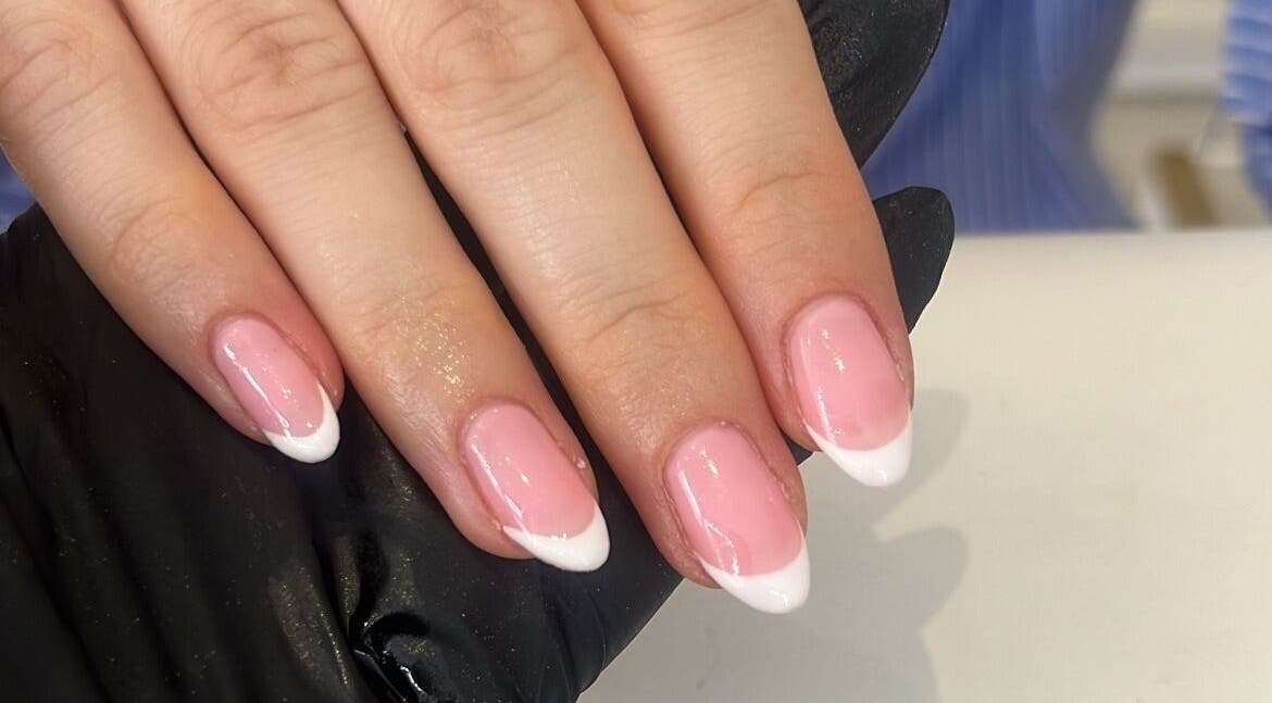 Elegant French manicure at Glam By TAM, Stevenage, England, GB, showcasing precision and style.