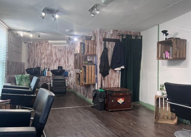 Elegant salon chairs at The Stock Room Hair & Beauty, Norwich, England, GB, creating a serene, welcoming ambiance.