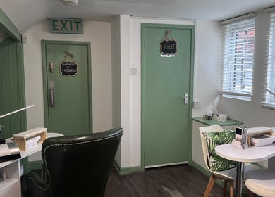 Cozy interior of The Stock Room Hair & Beauty in Norwich, England, GB, featuring stylish treatment area.
