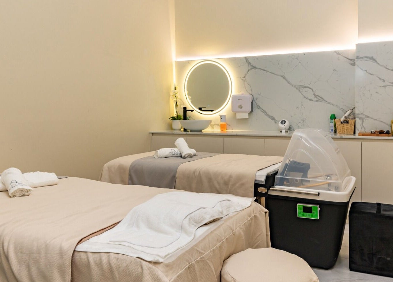 Elegant spa treatment room at Skin Glowing Zetland, Zetland, New South Wales, AU, featuring two massage beds.
