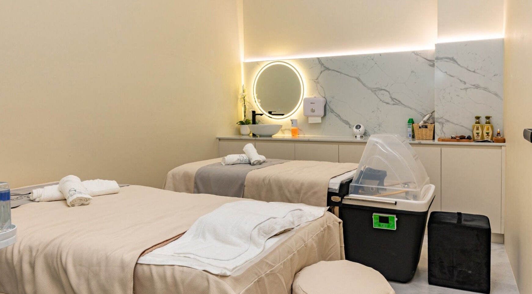 Elegant spa treatment room at Skin Glowing Zetland, Zetland, New South Wales, AU, featuring two massage beds.