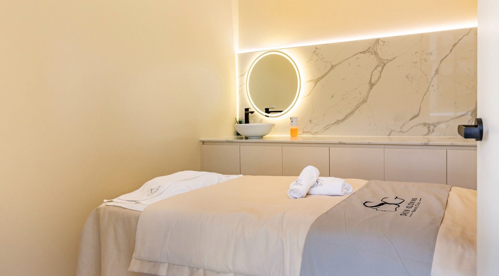 Calming treatment room at Skin Glowing Zetland, Zetland, New South Wales, AU with soft lighting and elegant decor.