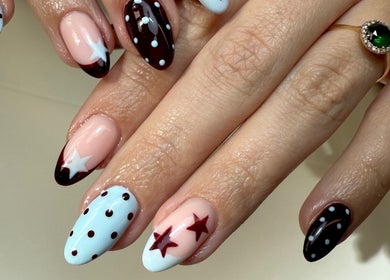 Elegant nail art with stars at Gels by Maria, Manchester, England, GB.