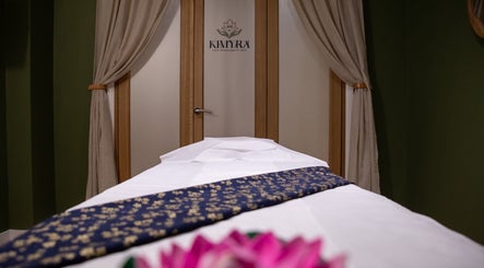 Relaxing massage room at Kimyra Thai Massage & Spa, Waltham Abbey, England, GB with elegant decor.