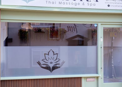 Front view of Kimyra Thai Massage & Spa in Waltham Abbey, England, with elegant signage and decor.