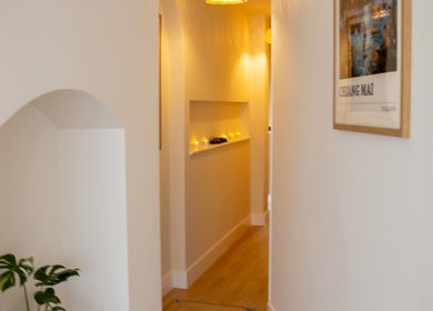 Serene hallway at Kimyra Thai Massage & Spa in Waltham Abbey, England, GB with soft lighting and decor.
