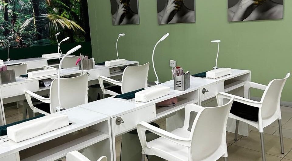 Sleek nail station at Banbury nails beauty wellness, Randburg, Gauteng, ZA with modern decor and greenery.