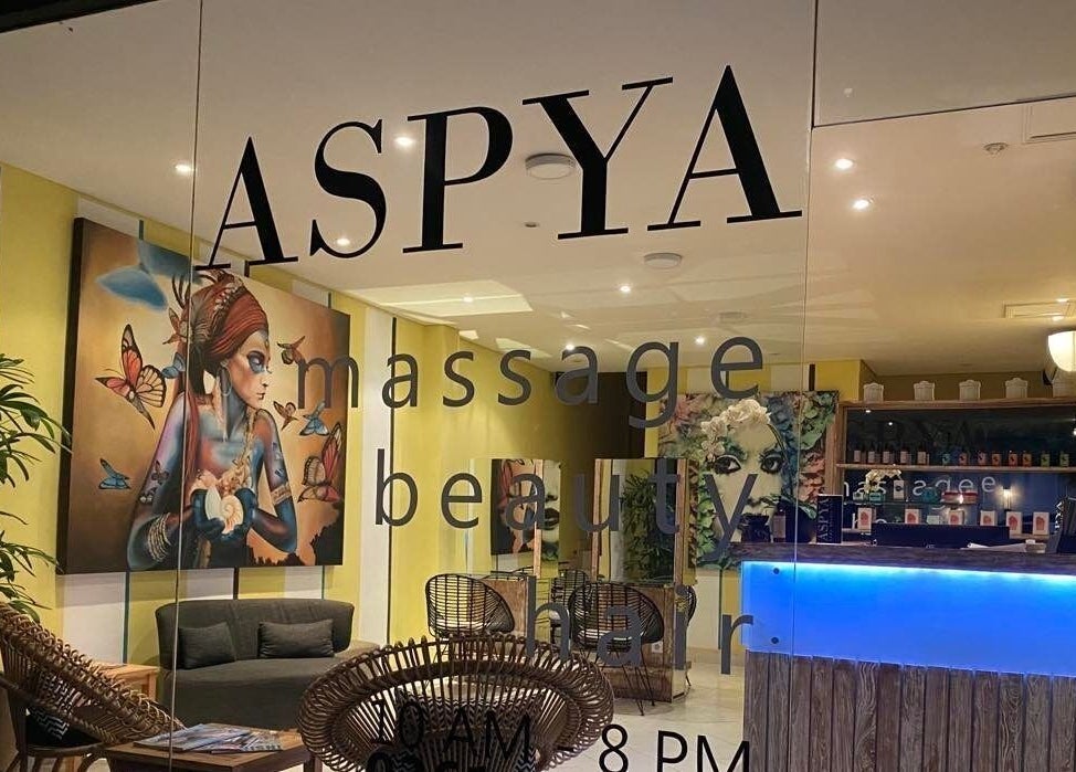 Relaxing interior view of Aspya Salon & Wellness, Bali, Bali, ID, featuring art and cozy seating.
