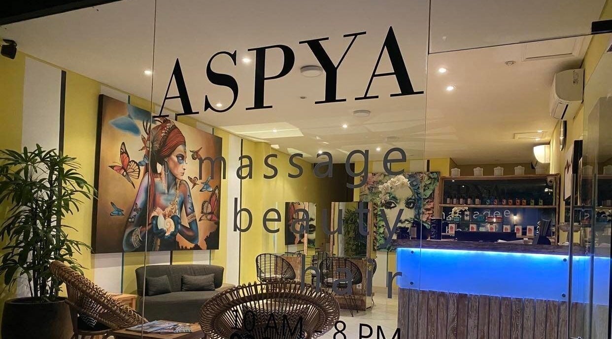 Relaxing interior view of Aspya Salon & Wellness, Bali, Bali, ID, featuring art and cozy seating.