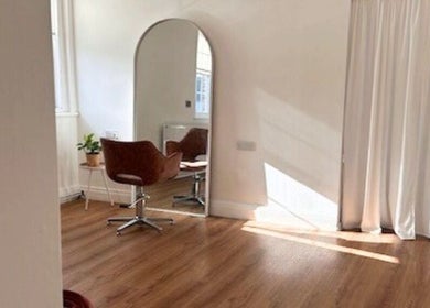 Elegant styling chair in sunlit studio at Mantra, Leeds, England, GB.